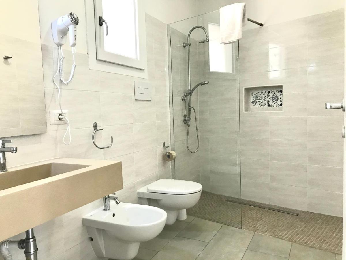 Angolo Mare Apartments & Rooms Porto Pino Eksteriør bilde