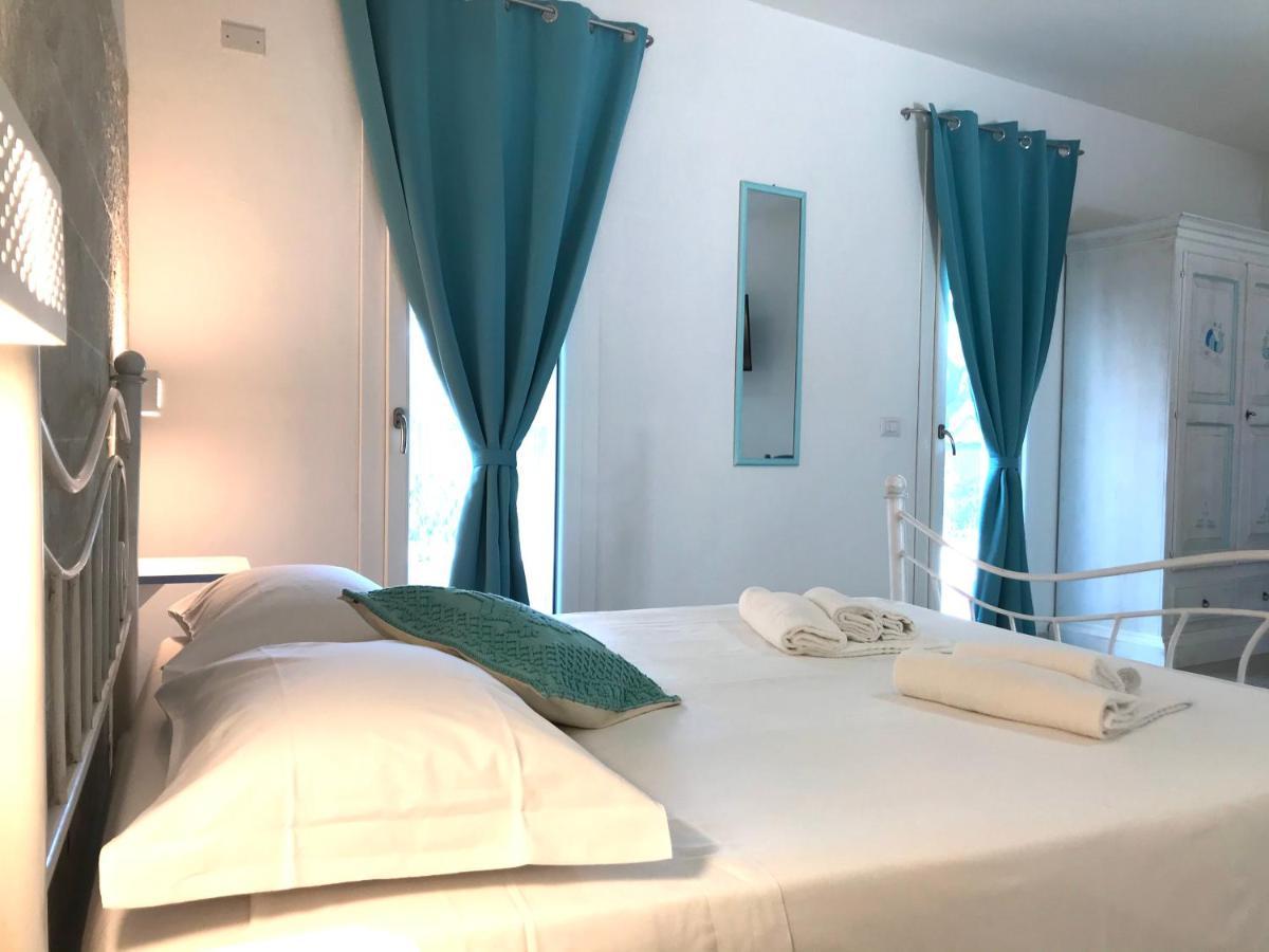 Angolo Mare Apartments & Rooms Porto Pino Eksteriør bilde