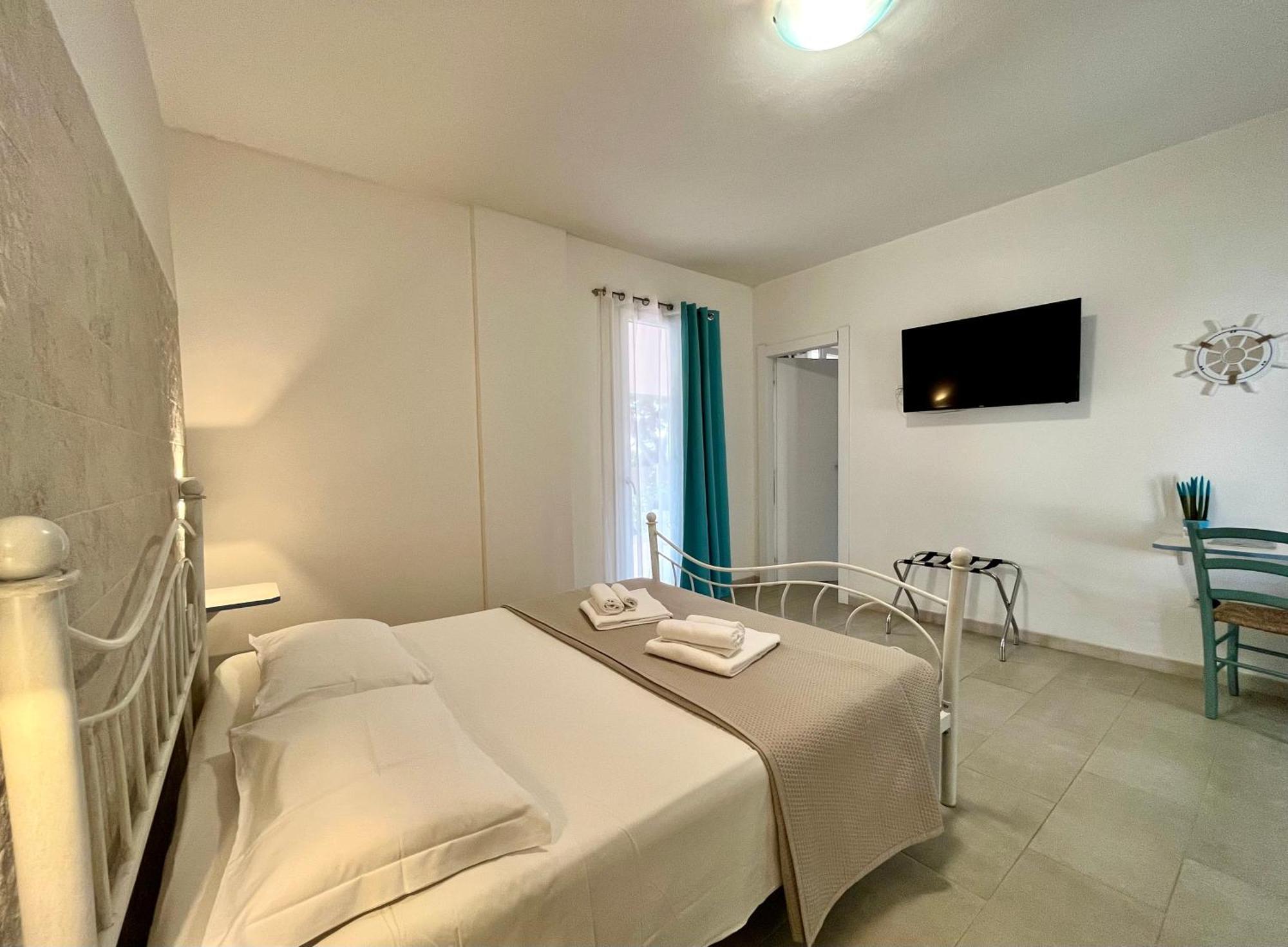 Angolo Mare Apartments & Rooms Porto Pino Eksteriør bilde