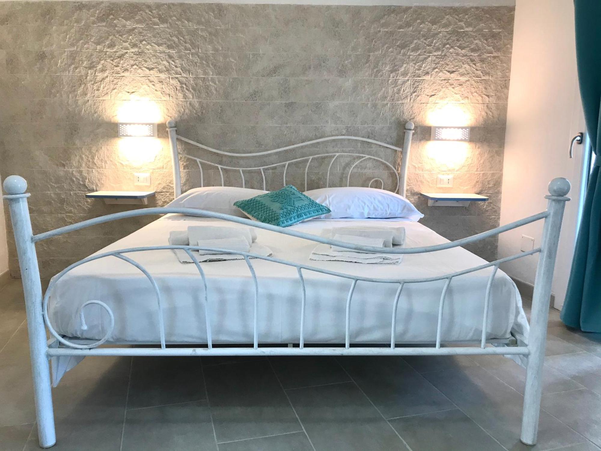 Angolo Mare Apartments & Rooms Porto Pino Eksteriør bilde